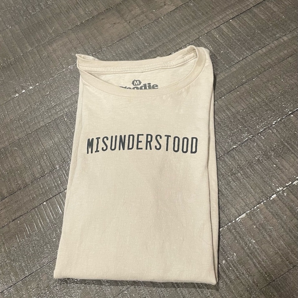 Goody Two Sleeves brand beige shirt ‘MISUNDERSTOOD’ word graphic. Excellent!